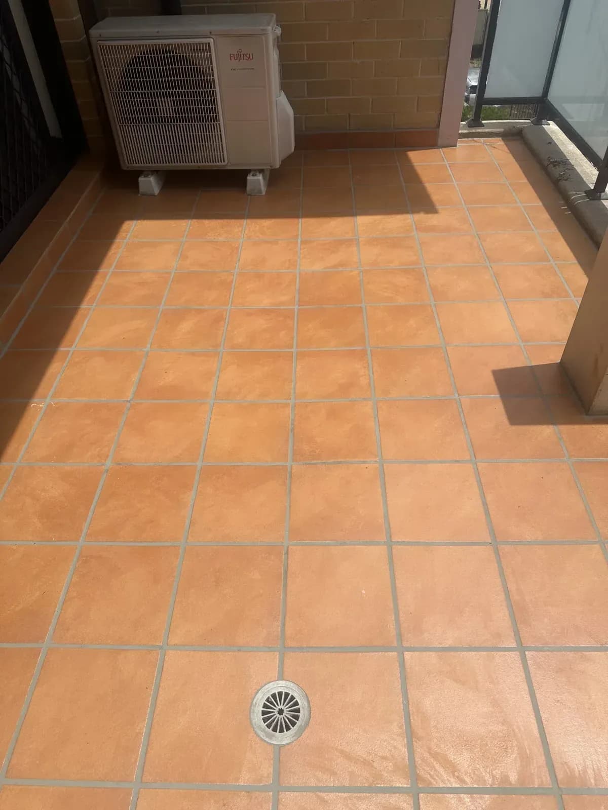 Sealed courtyard in terracotta tiles